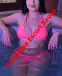 Promotional photo of a woman in a pink bikini lounging in a pool, with red text across the image reading 'Gaziantep Escort Bayan'.