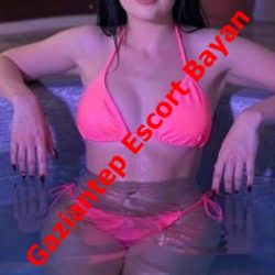 Promotional photo of a woman in a pink bikini lounging in a pool, with red text across the image reading 'Gaziantep Escort Bayan'.