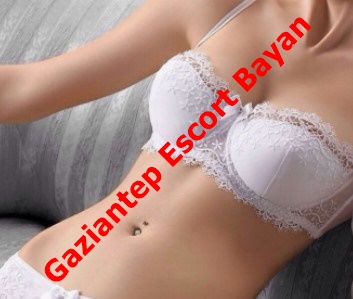 Woman in white lace lingerie lying on a couch with a red diagonal overlay reading 'Gazinter Escort Bayan'.