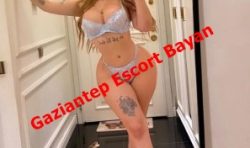 Woman in lingerie posing in a hallway; bold red text 'Gaziantep Escort Bayan' across the image.